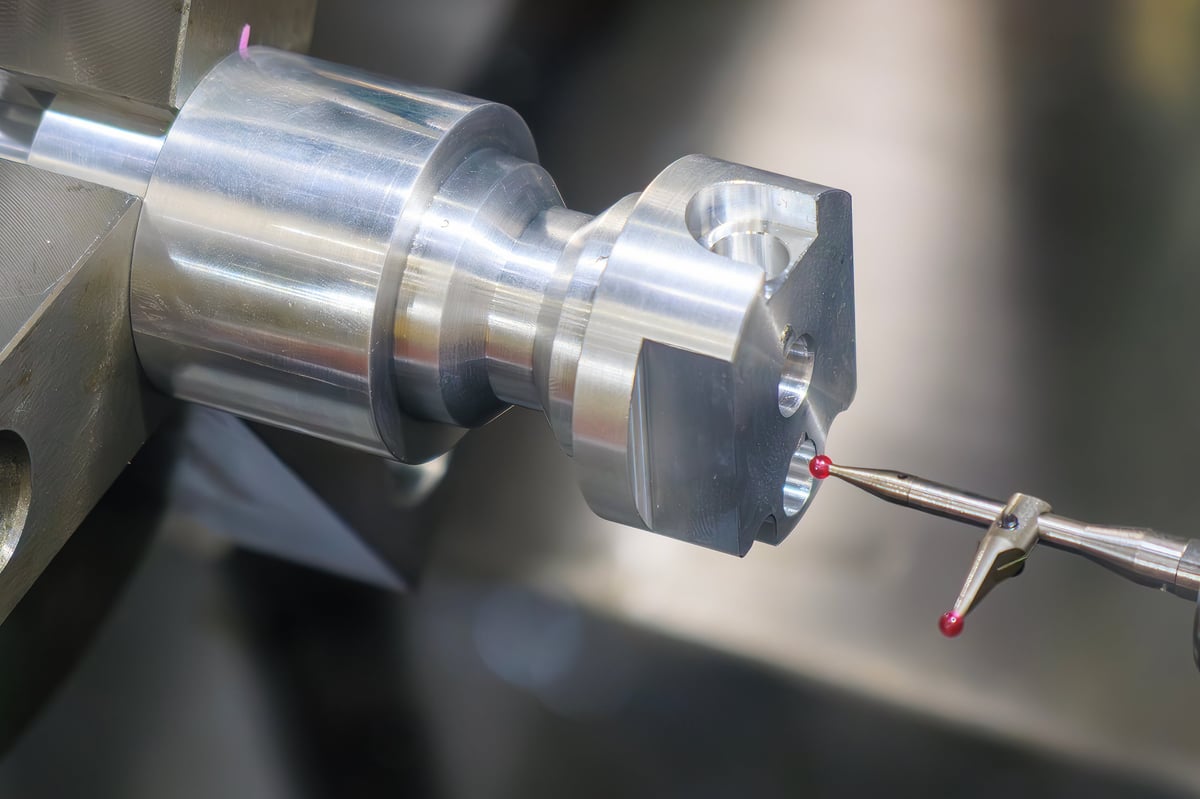 The modular touch probe checking the aluminum shaft parts on CNC lathe machine. The quality control of turning parts with CMM probe.
